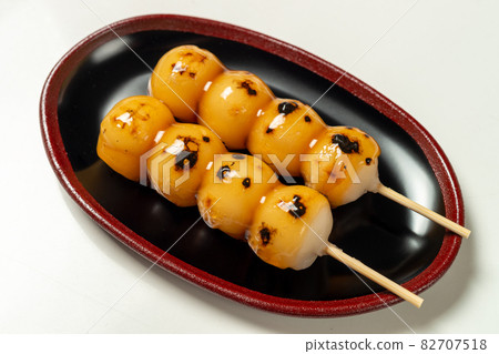 Freshly made and delicious Mitarashi dumplings Freshly made and delicious Mitarashi dumplings 82707518