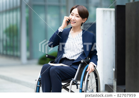 Wheelchair business woman middle 82707959