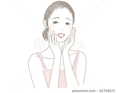 一個女人用兩隻手撫摸她的臉頰 82708872