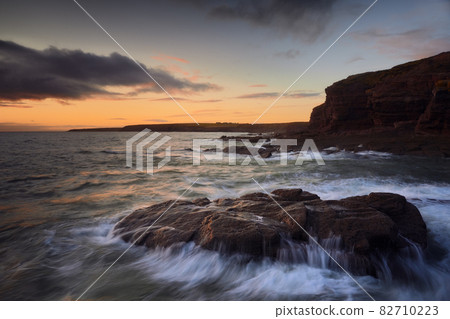 Rathmoylan Cove, Waterford, Ireland. Stunning rocks and sunset. Rathmoylan Cove, Waterford, Ireland. Stunning rocks and sunset. 82710223