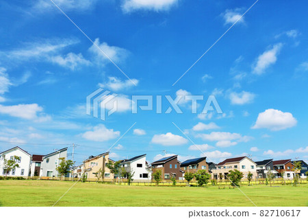 Blue sky cityscape: New residential area and park scenery 82710617