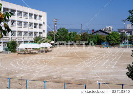 The schoolyard where the athletic meet is ready and the track is drawn with white lines 82710840