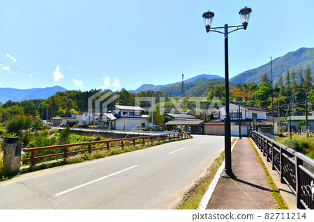 View toward Ogawayama from Kawahake Shinden Bridge / Kinpusan River (Kawakami Village, Nagano Prefecture) [2021.10] 82711214
