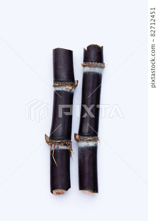 Sugar cane on white background. 82712451