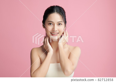 Beautiful young asian woman with clean fresh skin on pink background, Face care, Facial treatment, Beautiful young asian woman with clean fresh skin on pink background, Face care, Facial treatment, 82712858