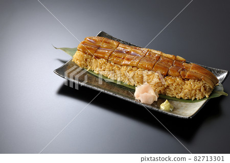 Conger eel placed on bamboo leaves Photographed sushi, gari and wasabi on a black background 82713301