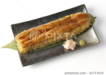A bird's-eye view of sushi, gari and wasabi on a white background 82713429