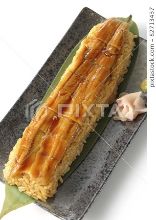 A bird's-eye view of sushi, gari and wasabi on a white background 82713437