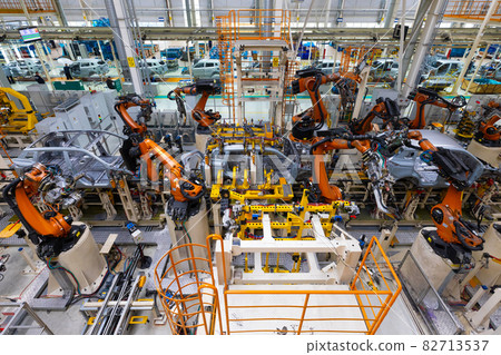 assembly line in a car factory, welding with robots, automated work assembly line in a car factory, welding with robots, automated work 82713537