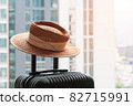Suitcase and hat in hotel room. concept of Travel and vacation 82715991