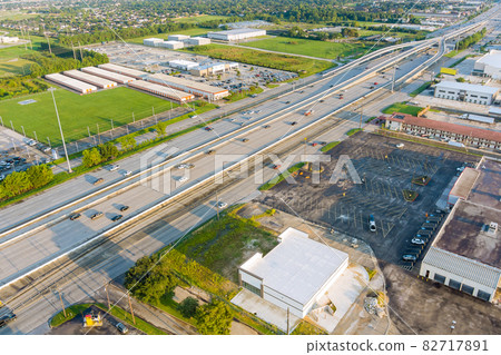 Aerial overlooking Houston city of beautiful highway Texas with traffic line in 45 Interstate expressway USA Aerial overlooking Houston city of beautiful highway Texas with traffic line in 45 Interstate expressway USA 82717891