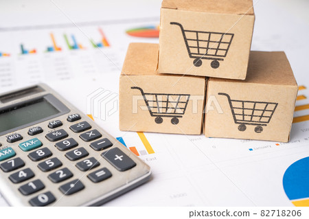 Shopping cart logo on box with magnifying glass on graph background. Banking Account, Investment Analytic research data economy, trading, Business import export transportation online company concept. 82718206