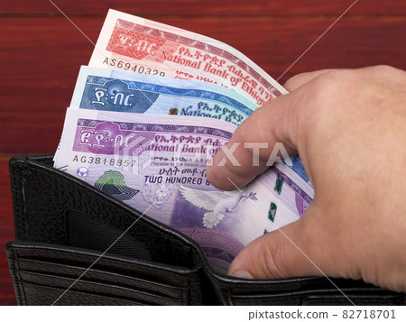 Ethiopian money in the black wallet Ethiopian money in the black wallet 82718701