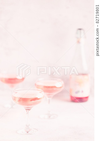 Champagne or wine in glasses on light background. 82719801