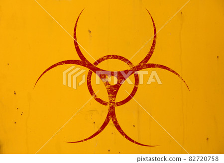Red biohazard sign over yellow background 82720758