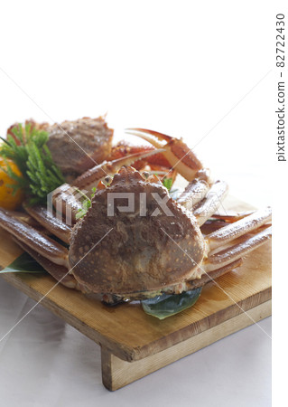 Fresh hairy crab on a wooden plate and white background. Fresh hairy crab on a wooden plate and white background. 82722430