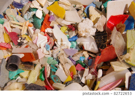 Waste plastic, plastic trash washed up on a sandy beach, microplastic, environmental destruction, environmental problems 82722653