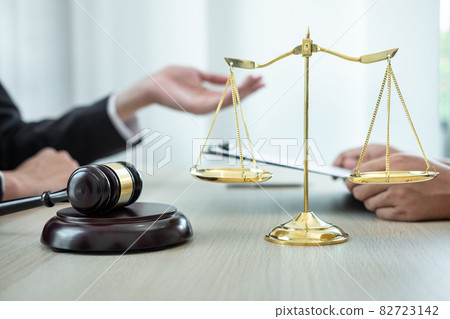 Male lawyer or counselor discussing negotiation legal case with client meeting with document contract in office, law and justice, attorney, lawsuit concept Male lawyer or counselor discussing negotiation legal case with client meeting with document contract in office, law and justice, attorney, lawsuit concept 82723142