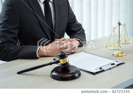 Male lawyer working with legal case document contract in office, law and justice, attorney, lawsuit concept Male lawyer working with legal case document contract in office, law and justice, attorney, lawsuit concept 82723143