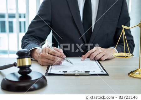 Male lawyer working with legal case document contract in office, law and justice, attorney, lawsuit concept Male lawyer working with legal case document contract in office, law and justice, attorney, lawsuit concept 82723146