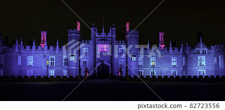 Illuminated Hampton Court Palace by night 82723556