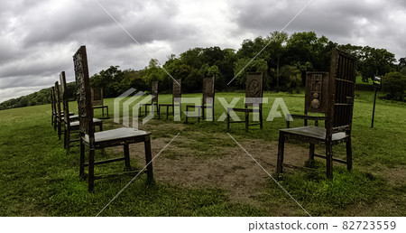12 bronze chairs - Jurors artwork by Hew Locke in Runnymede, Surrey, United Kingdom 82723559