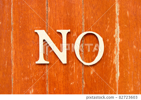 Alphabet letter in word no on old red color wood plate background Alphabet letter in word no on old red color wood plate background 82723603