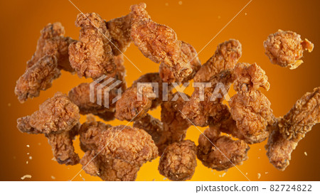 Flying tasty fried chicken wings or strips 82724822