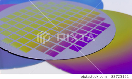 Several silicon wafers with printed circuit and different color.White background Several silicon wafers with printed circuit and different color.White background 82725131