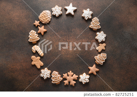Christmas wreath of assorted cookies, cinnamon, anise stars, berries, orange chips, spruce branches. Christmas wreath of assorted cookies, cinnamon, anise stars, berries, orange chips, spruce branches. 82725251