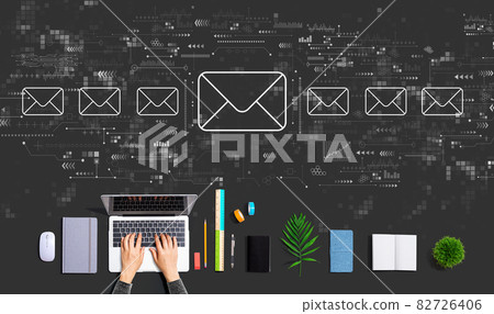 Email concept with person using a laptop Email concept with person using a laptop 82726406