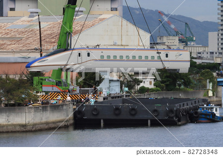 E7 series Shinkansen vehicle loaded on the barge from Kawasaki Heavy Industries 82728348