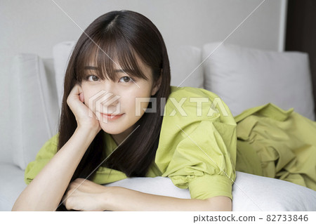 A woman relaxing on the sofa 82733846
