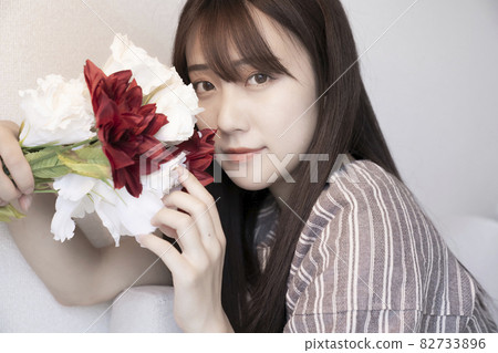 Flower and woman portrait Flower and woman portrait 82733896
