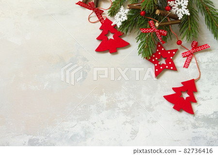 Christmas composition.Branches of spruce and red decorations. Christmas, winter, new year concept. Top view flat lay. Free space for your text. 82736416