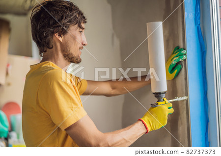 Builder or handyman is engaged in the repair or installation of windows 82737373