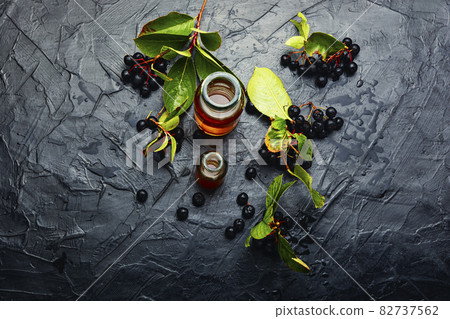 Chokeberry berries in herbal medicine Chokeberry berries in herbal medicine 82737562