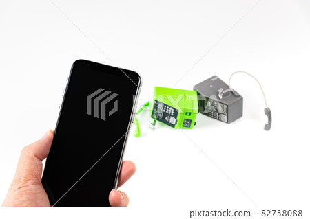 Image of public telephones that change generations to smartphones 82738088