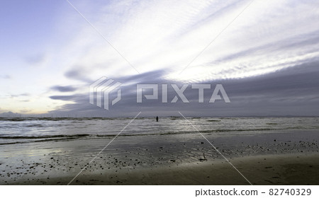 Sunset on Crosby Beach in winter, Crosby, Liverpool, United Kingdom Sunset on Crosby Beach in winter, Crosby, Liverpool, United Kingdom 82740329