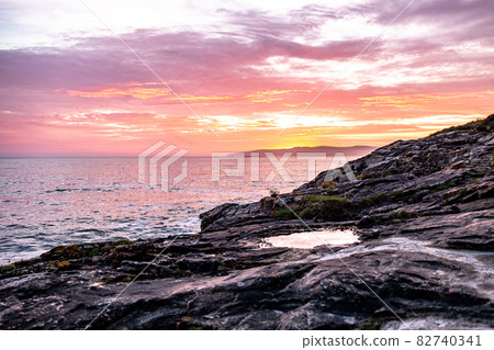 Sunset above Aran Island - Arranmore - County Donegal, Ireland. Sunset above Aran Island - Arranmore - County Donegal, Ireland. 82740341