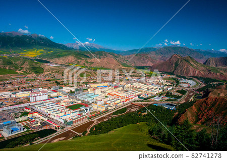 A bird's-eye view of the Qilian cityscape at the foot of Mt. Ushishin from Mt. A bird's-eye view of the Qilian cityscape at the foot of Mt. Ushishin from Mt. 82741278