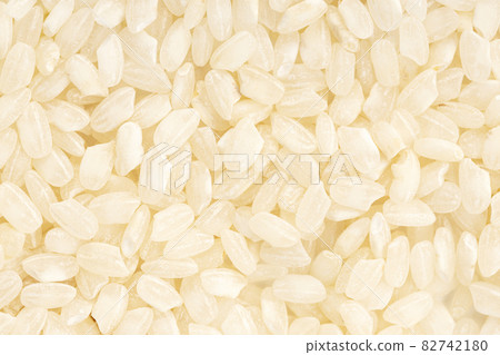 Uncooked rice background texture. Full frame Uncooked rice background texture. Full frame 82742180