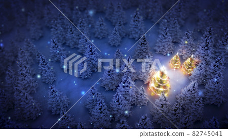 lightened christmas trees surrounded by snow-covered pine trees at night 82745041