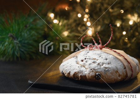 Christmas stollen - traditional German bread on brown. Christmas stollen - traditional German bread on brown. 82745781