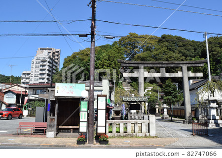 Ome City, Tokyo Retro bus stop and torii gate of Sumiyoshi Shrine Ome City, Tokyo Retro bus stop and torii gate of Sumiyoshi Shrine 82747066
