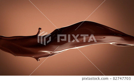 Macro photo of premium dark chocolate splash. 82747703
