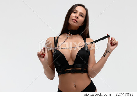Sexy woman in collar and black lingerie - Stock Photo [82747885]
