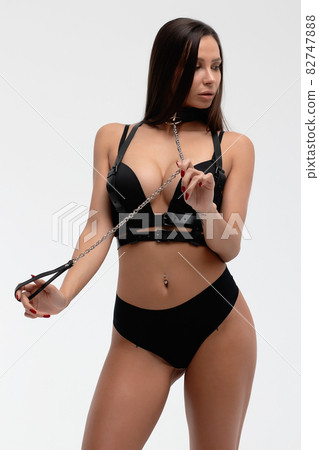 Sexy woman in collar and black lingerie Stock Photo 82747888