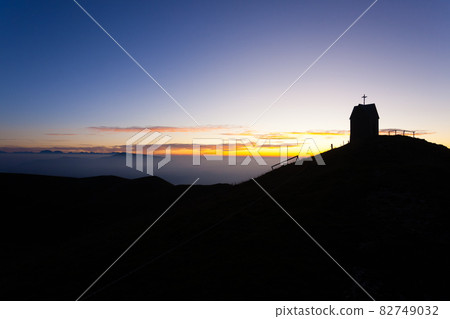 Dawn at the little church, mount Grappa landscape, Italy 82749032