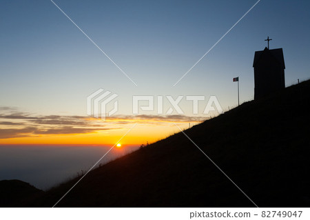 Dawn at the little church, mount Grappa landscape, Italy 82749047